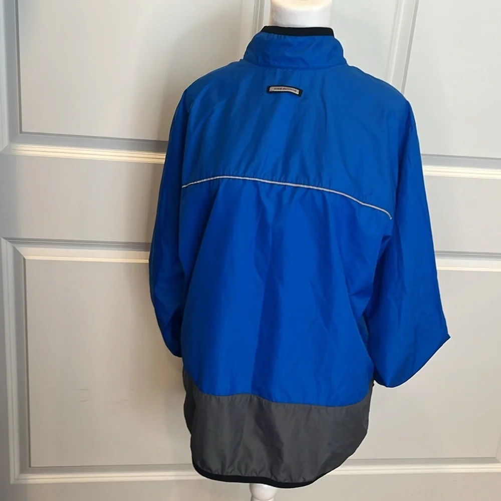 Nike youth L royal blue grey 1/2 zip windbreaker. Loose fit. Great condition